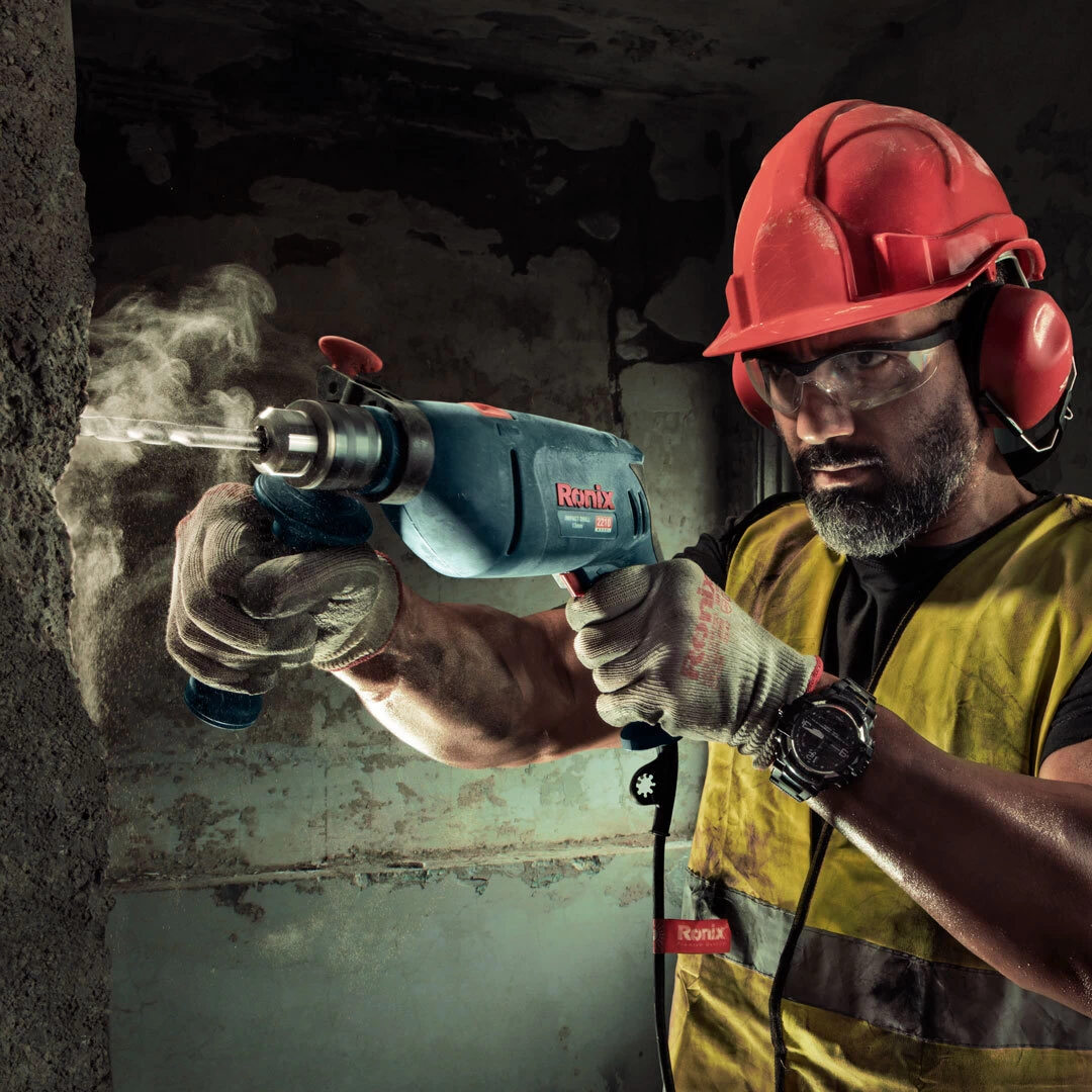 دریل چکشی ۱۳ میلی‌متر ۸۱۰ وات رونیکس 2210